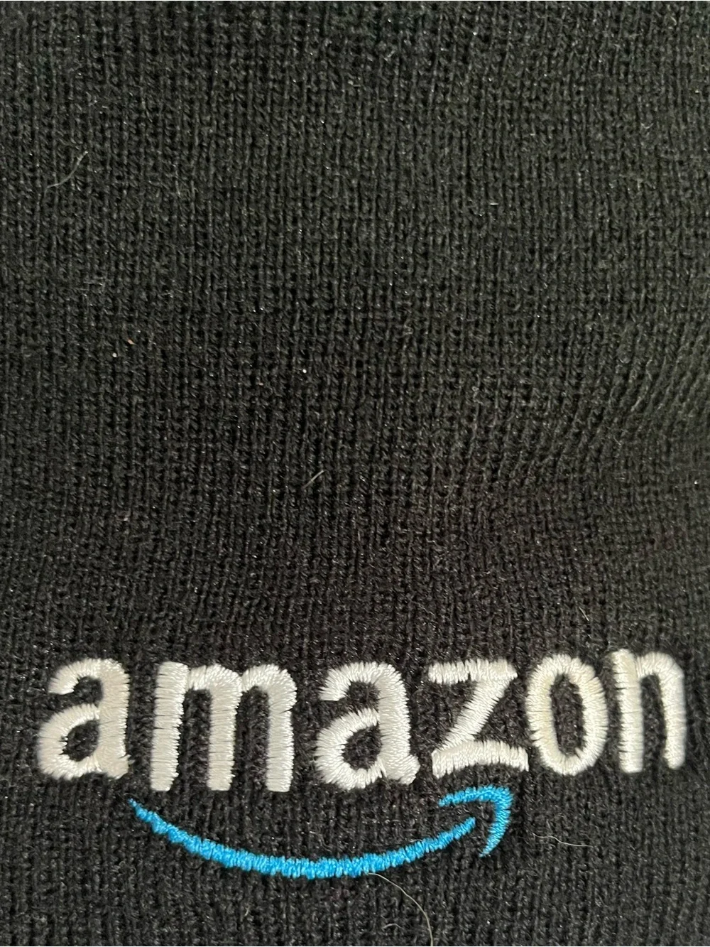 Amazon Black Knit Beanie with White Logo and Blue Arrow.  0004